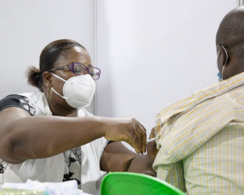 A man being vaccinated against COVID-19 at the vaccination cente